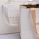 black paper shopping bags